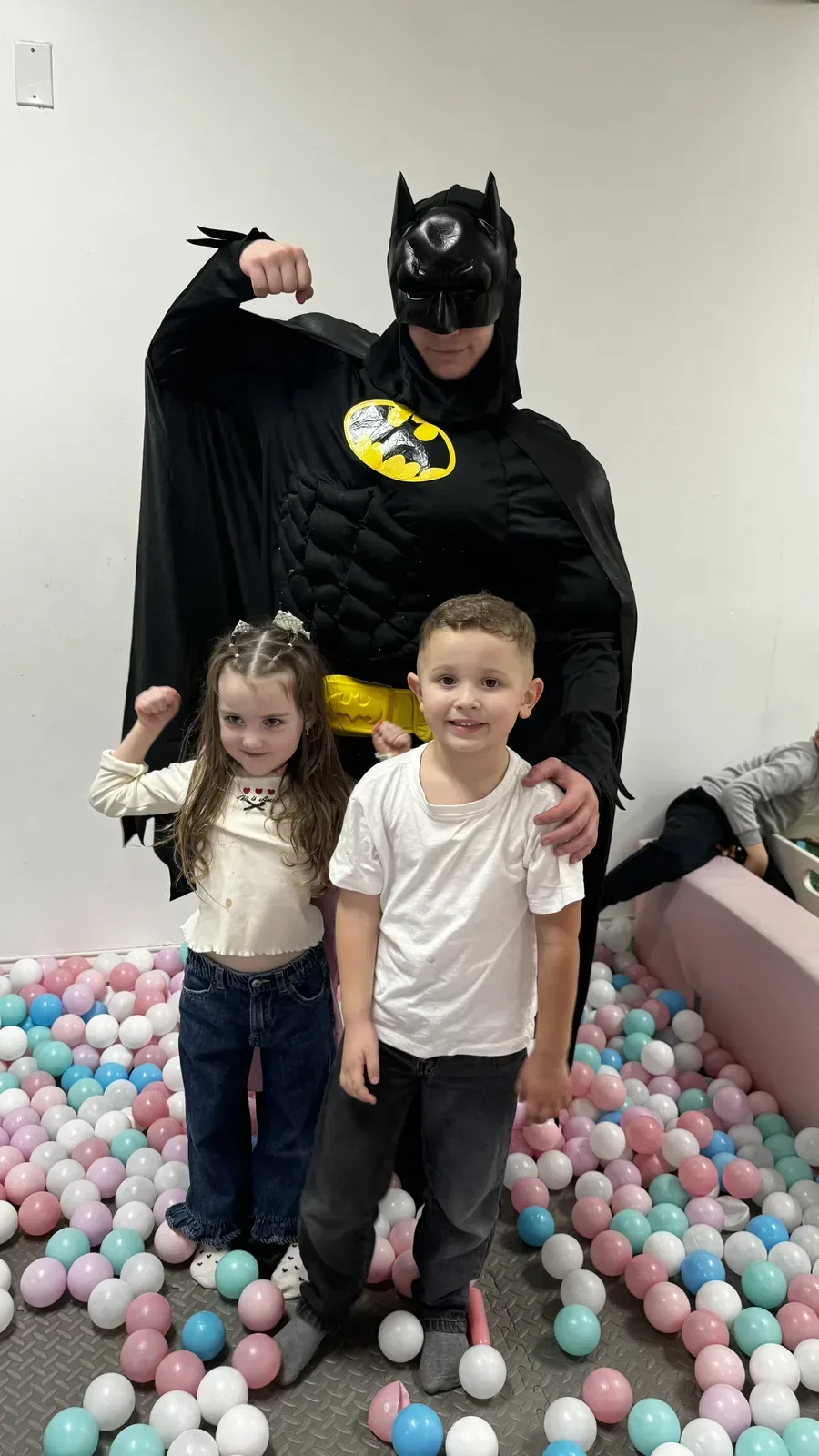 Batman at a kids party