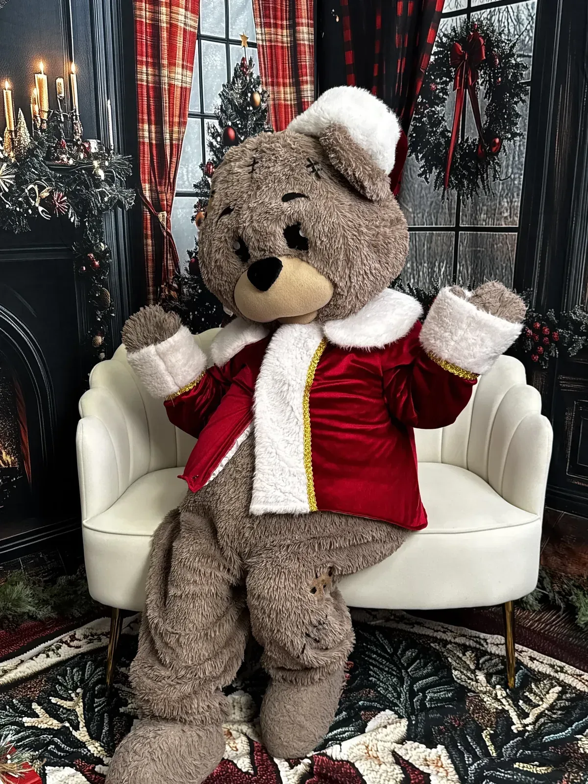Christmas Bear on a cream armchair