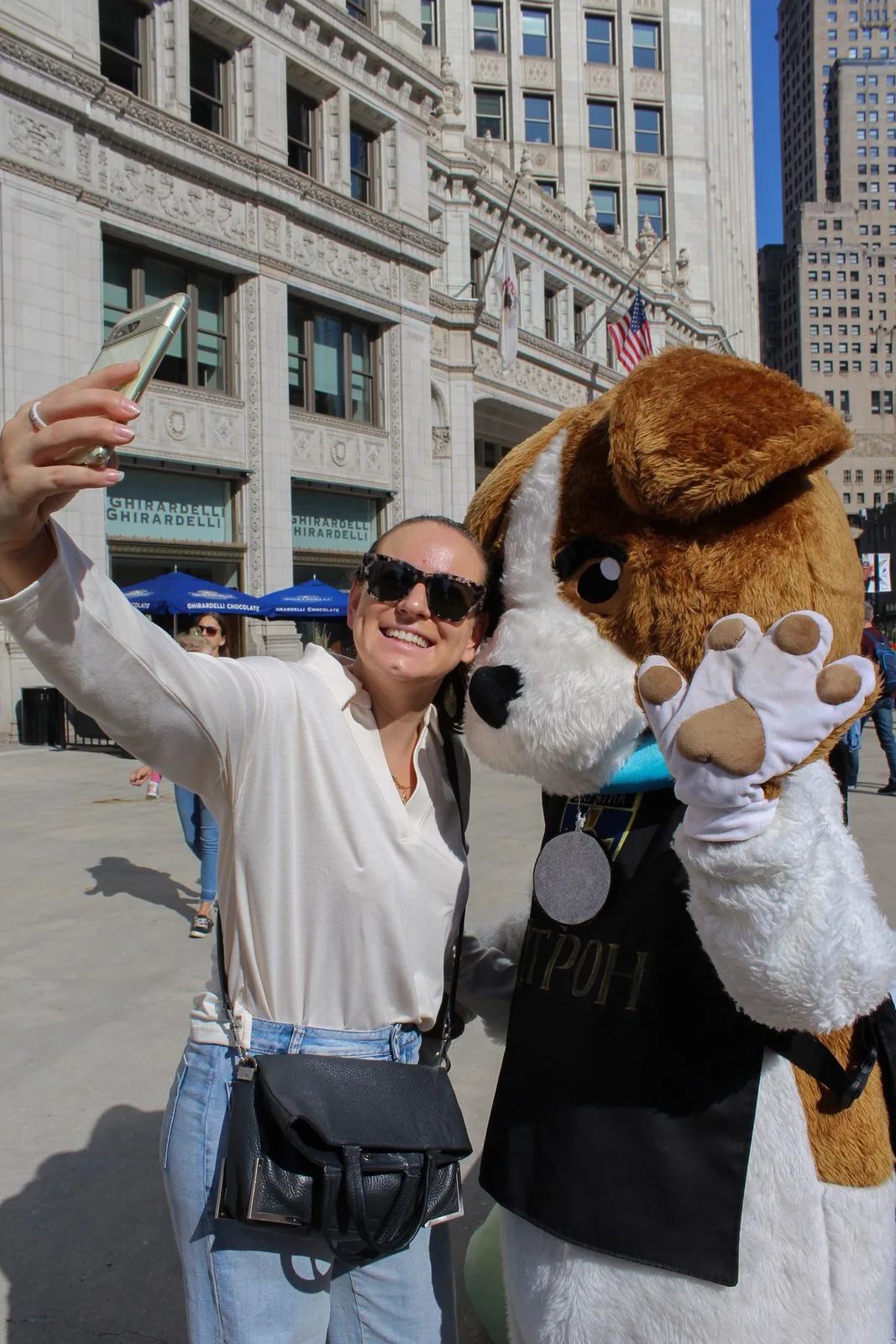 Selfie with friendly dog mascot in downtown Chicago