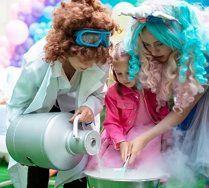 Kids in lab coats with steamy cryo science experiment