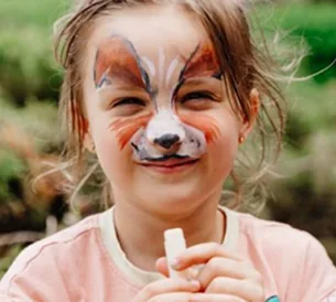 Girl with playful fox face painting