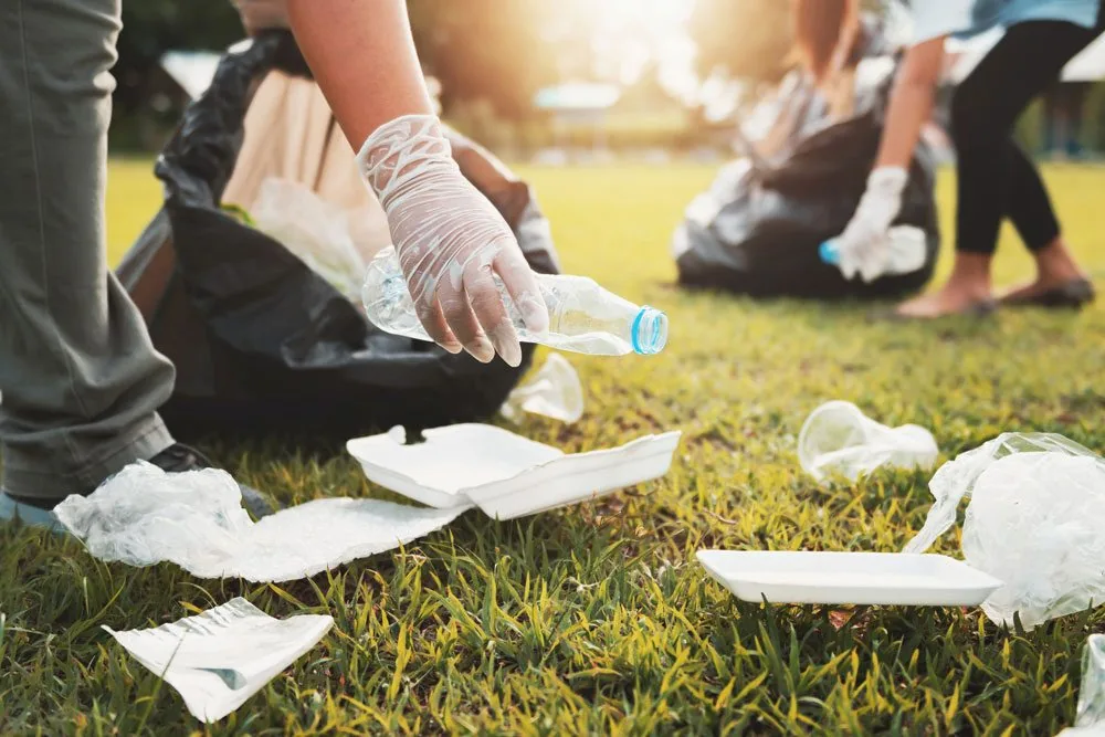 Cleaning crew collecting trash after an event