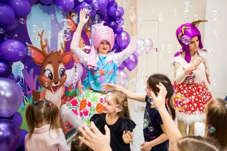 Bubble show with deer mascot and unicorn performer